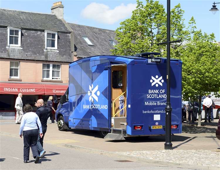Bank of Scotland mobile branch on a town street